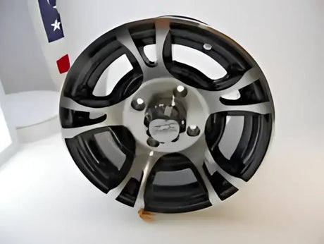 Black and silver aluminum wheel for QuadBoss QBoss Carburetor Kit, looks sleek and stylish