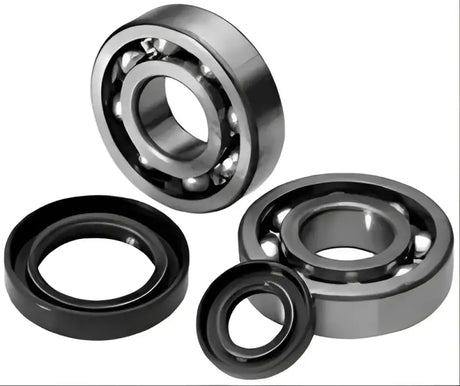 Ball bearings and seals from the QuadBoss Qboss Crankshaft Bearing Kit for engine repair