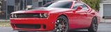Red Dodge Challenger SRT with QuadBoss Qboss Shock Kit for better ride quality