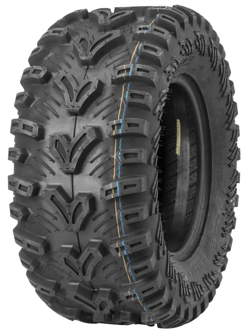 Aggressive tread quadboss qbt448 utility tire on quadbike or utility vehicle
