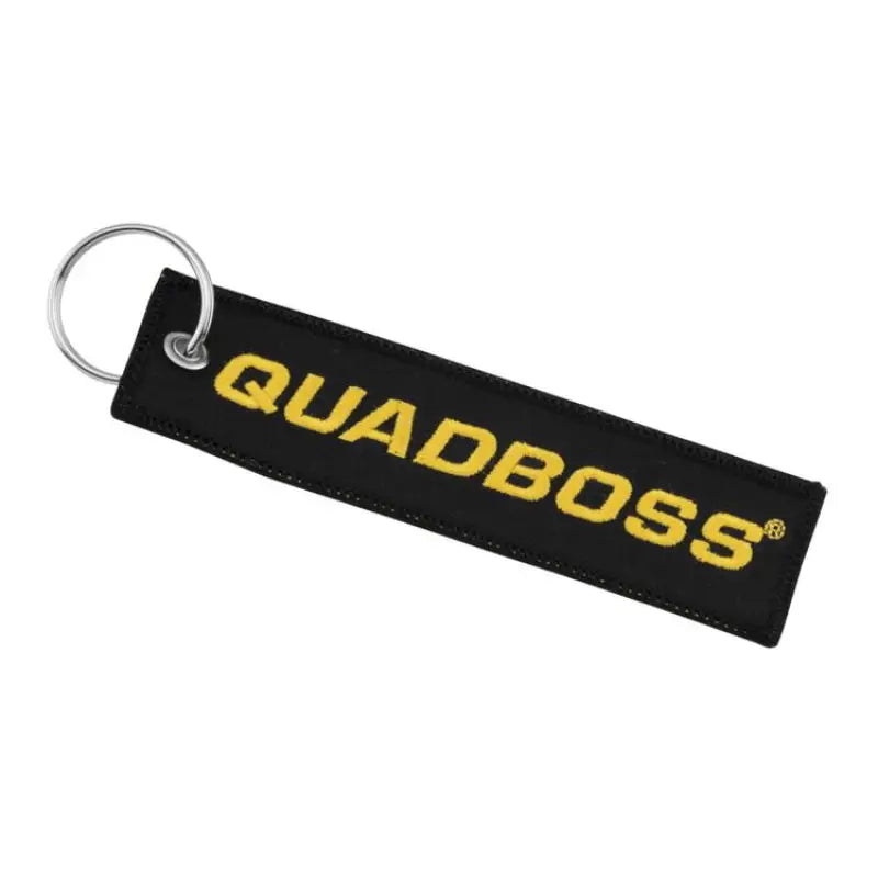 Black QuadBoss Ripcord Keychain with yellow lettering for a cool look