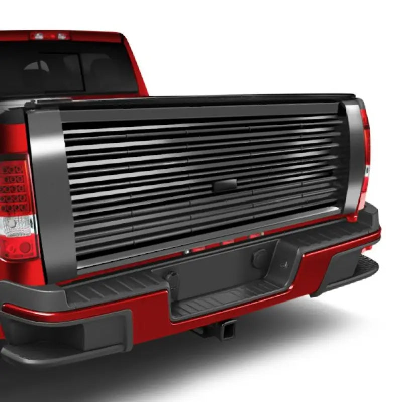 Red pickup truck with retractable bed cover featuring Advance Mfg Customflow Regular Tailgate