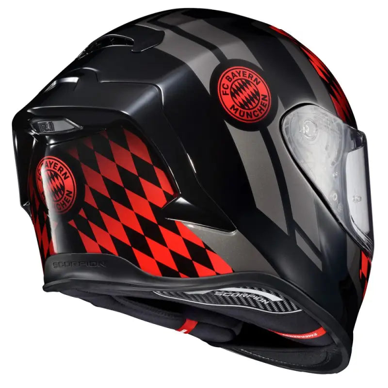 Black and gray Exo-R1 Air motorcycle helmet with cheek pads and face shield, red accents