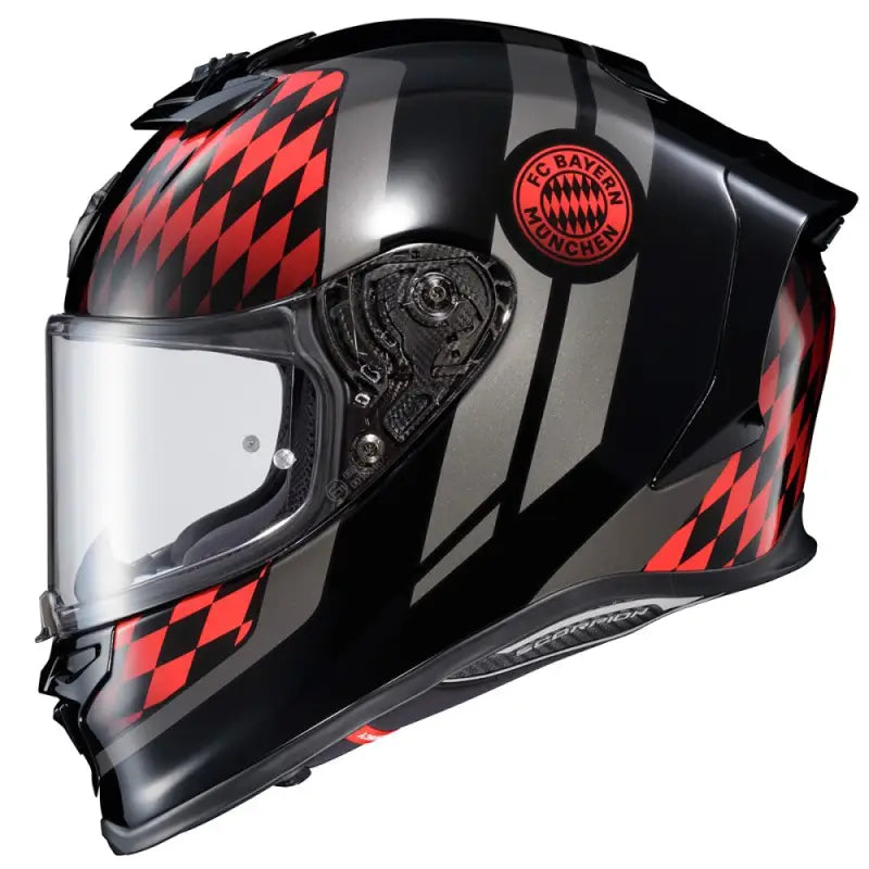 Black gray motorcycle helmet with red checkered pattern, FC Bayern München logo, cheek pads, exo-r1 air, and face shield