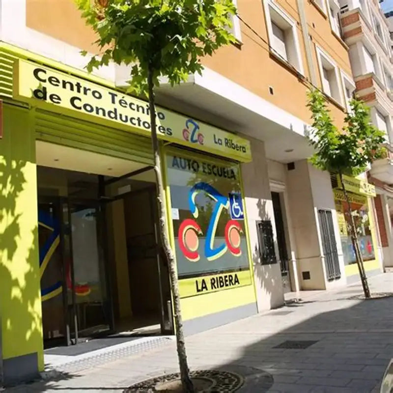 Driving school storefront with Exo-R1 Air face shield and cheek pads inside