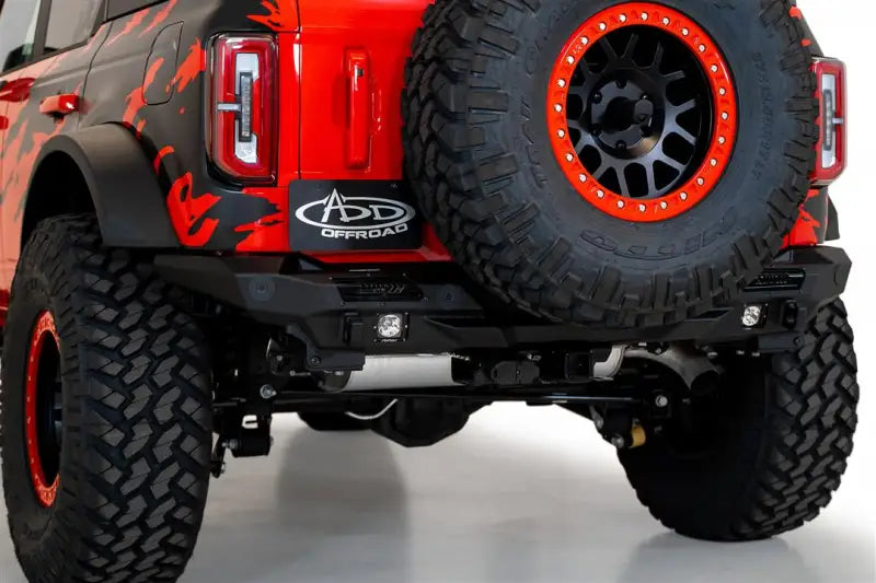 R230081370103 Addicted Desert Design Stealth Fighter Rear Bumper installed on a rugged off-road vehicle, showcasing its aggressive design and durability.