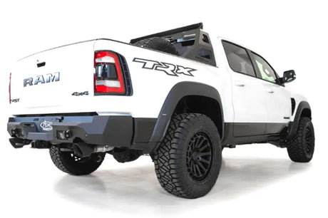 R620081280103 A.Desert Des Stealth Fighter Rear Bumper, rugged off-roading RAM TRX truck equipped with robust rear bumper enhancement.