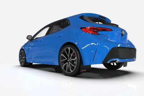 Vibrant blue Ford Focus ST with rally armor black mud flaps and sporty wheels