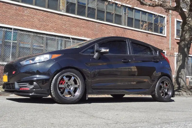 Ford Fiesta with Rally Armor black mud flap and custom wheels for style and protection