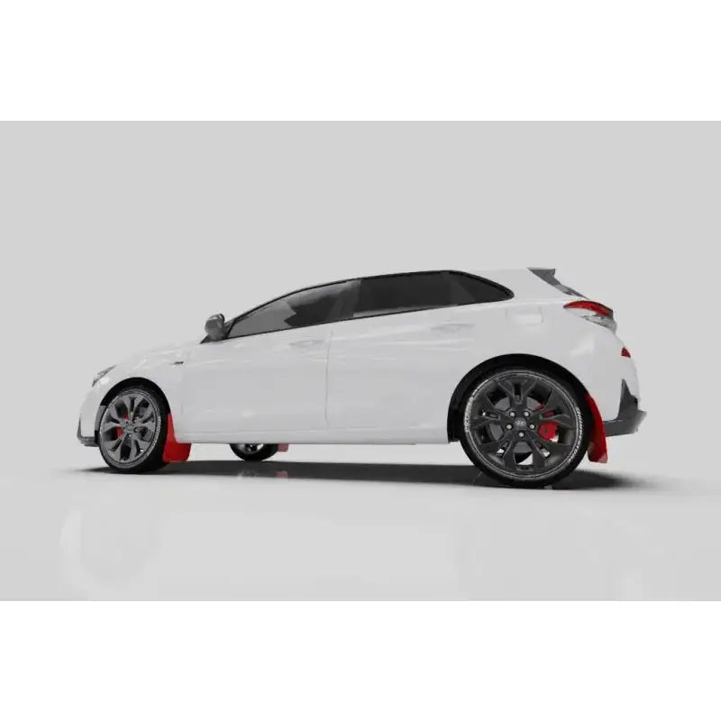 White Hyundai Elantra N Line with Rally Armor red mud flaps and grey logo
