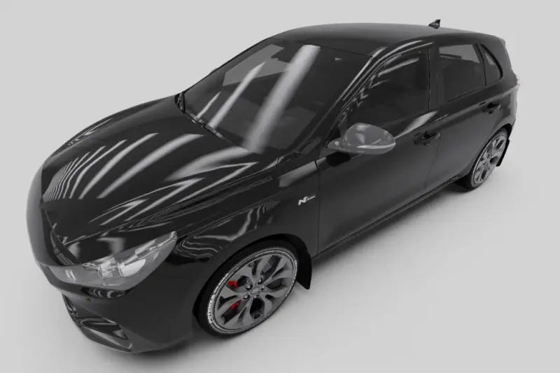 Black hatchback car featuring Rally Armor mud flaps on a Hyundai Elantra N Line