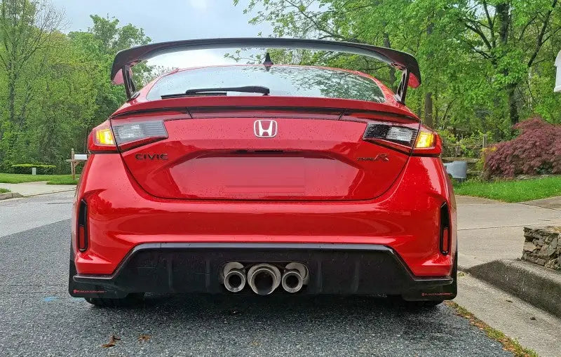Rear view of a red 2023 Honda Civic Type R equipped with Rally Armor black UR polyurethane mud flaps featuring a red logo.