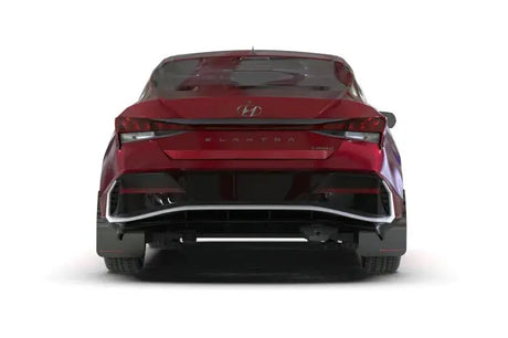 Rear view of a red Hyundai Elantra with black mud flap and white logo in Rally Armor 2024