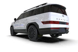 White Hyundai Santa Fe Black SUV with Rally Armor mud flaps featuring white logo