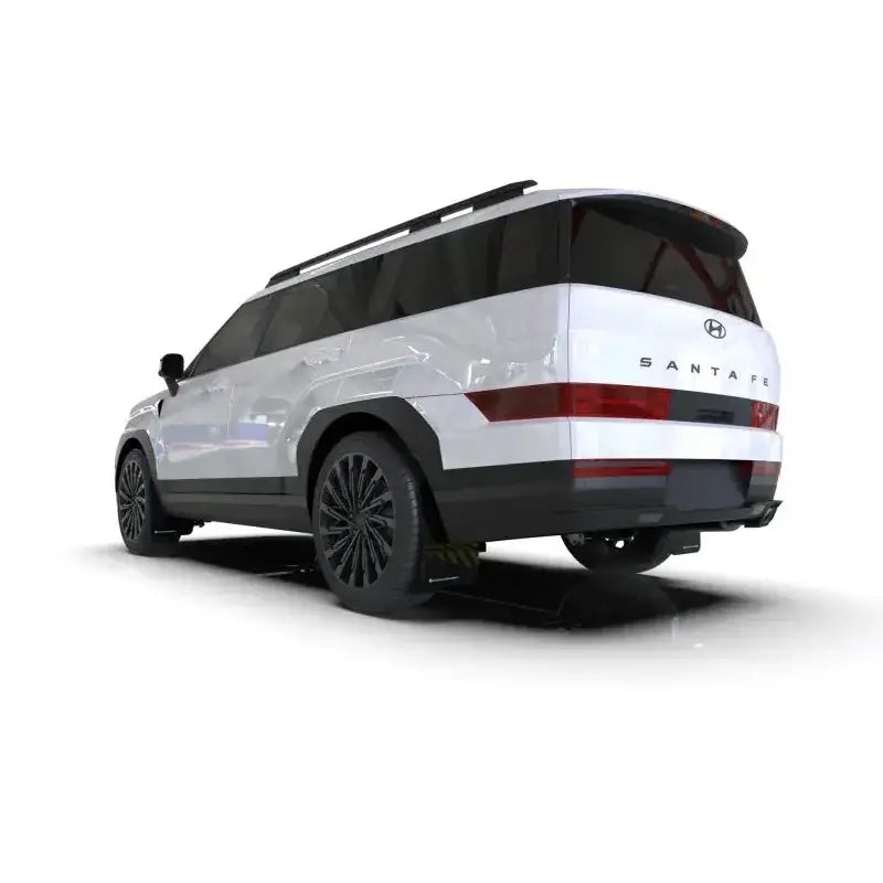 White Hyundai Santa Fe Black SUV with Rally Armor mud flaps featuring white logo