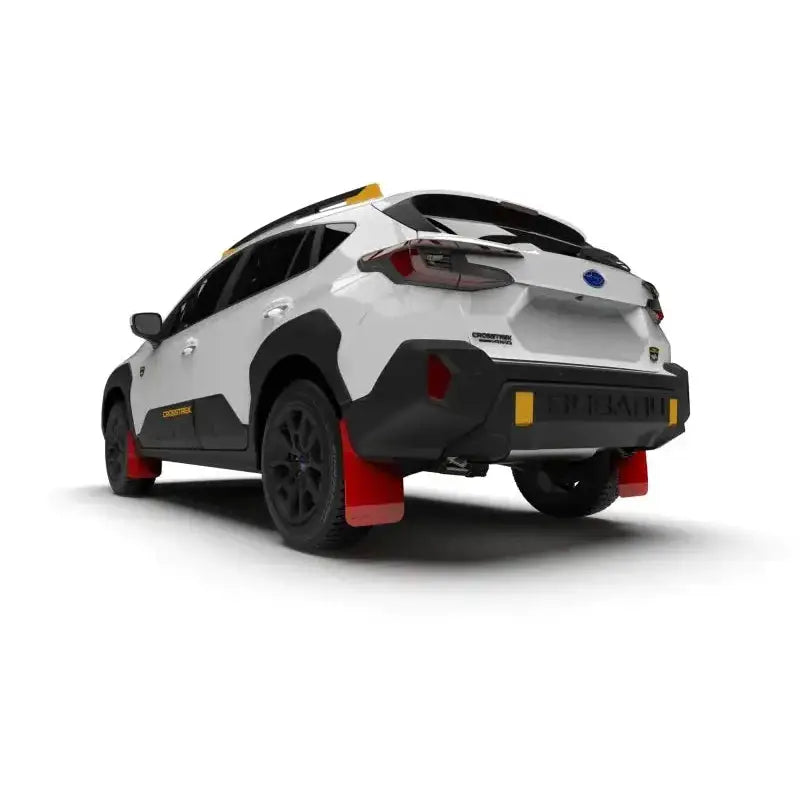 White Subaru Crosstrek SUV with red UR mud flaps by Rally Armor