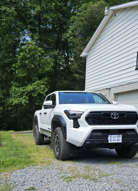 Rally Armor 2024 Toyota Tacoma Gen 4 Black UR Mud Flap w/Metallic Logo - Body & Protection