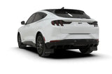 White electric Ford Mustang SUV with black wheels and metallic black logo mud flaps
