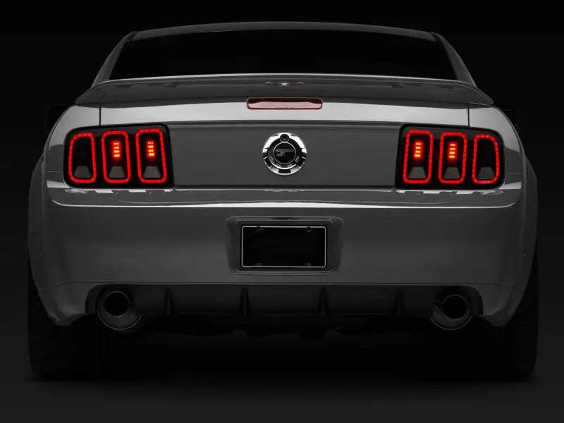 Raxiom 05-09 Ford Mustang Gen5 Tail Lights- Black Housing (Smoked Lens) - Truck & Automotive