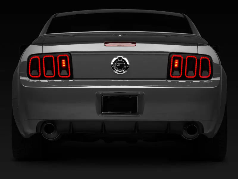 Raxiom 05-09 Ford Mustang Gen5 Tail Lights- Black Housing (Smoked Lens) - Truck & Automotive