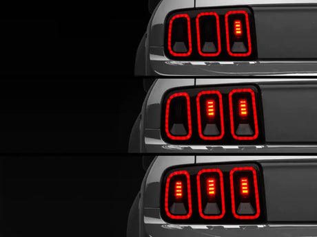 Raxiom 05-09 Ford Mustang Gen5 Tail Lights- Black Housing (Smoked Lens) - Truck & Automotive