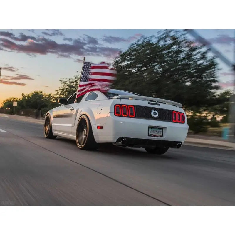 Raxiom 49169 Raxiom 05-09 Ford Mustang Gen5 Tail Lights- Black Housing (Smoked Lens)