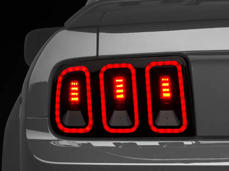 Raxiom 05-09 Ford Mustang Gen5 Tail Lights- Black Housing (Smoked Lens) - Truck & Automotive