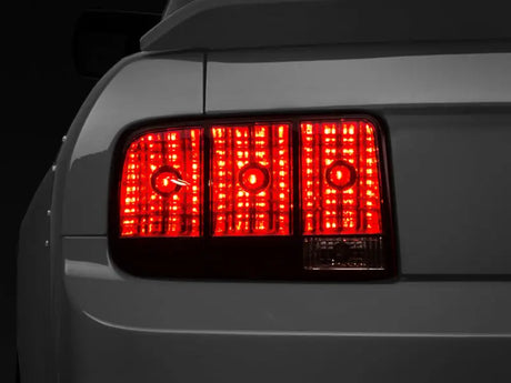 Raxiom 05-09 Ford Mustang Tail Lights- Black Housing (Smoked Lens) - Truck & Automotive