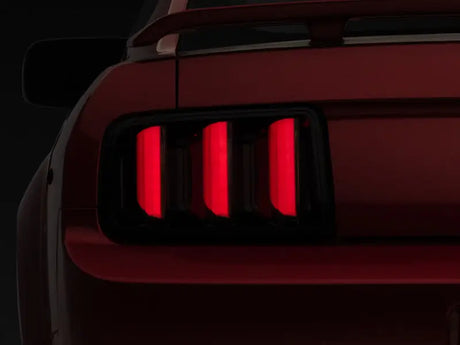 Raxiom 05-09 Ford Mustang Vector V2 LED Tail Lights- Black Housing (Smoked Lens) - Truck & Automotive