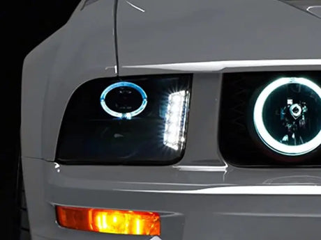 Raxiom 05-09 Ford Mustang w/ Halogen LED Halo Prjctr Headlights-Blk Hsng(Smoked Lens Exclude GT500) - Truck & Automotive
