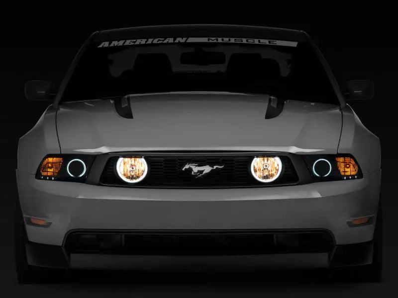 Gray Ford Mustang with illuminated LED halo fog lights in chrome for a sleek look