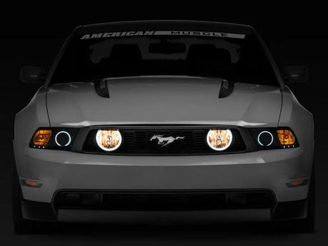 Gray Ford Mustang with illuminated LED halo fog lights in chrome for a sleek look