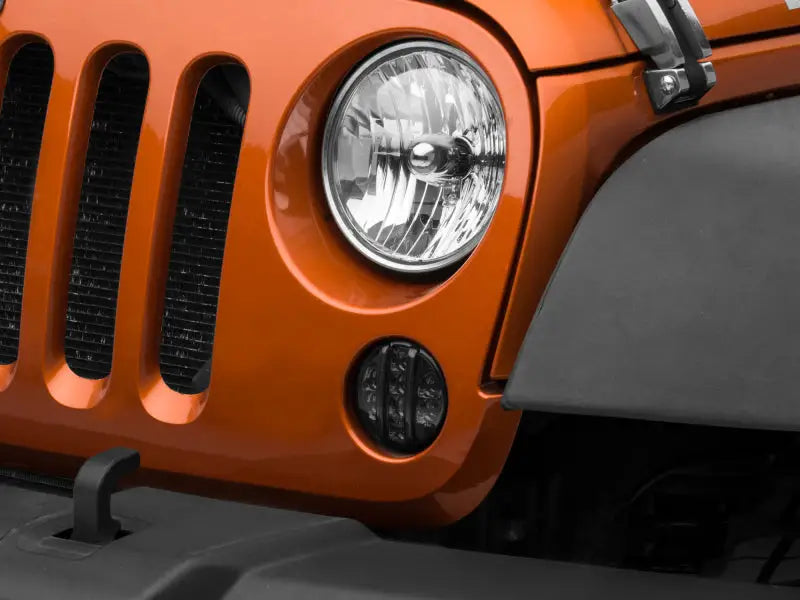 Raxiom 07-18 Jeep Wrangler JK Axial Series LED Front Turn Signals (Smoked) - Truck & Automotive