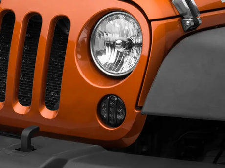 Raxiom 07-18 Jeep Wrangler JK Axial Series LED Front Turn Signals (Smoked) - Truck & Automotive