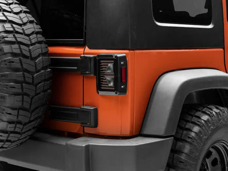 Raxiom 07-18 Jeep Wrangler JK Axial Series Vision LED Tail Lights- Black Housing (Smoked Lens) - Truck & Automotive