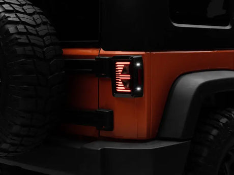 Raxiom 07-18 Jeep Wrangler JK Axial Series Vision LED Tail Lights- Black Housing (Smoked Lens) - Truck & Automotive