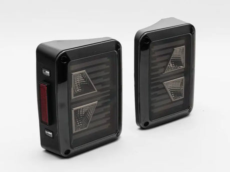 Raxiom 07-18 Jeep Wrangler JK Axial Series Vision LED Tail Lights- Black Housing (Smoked Lens) - Truck & Automotive