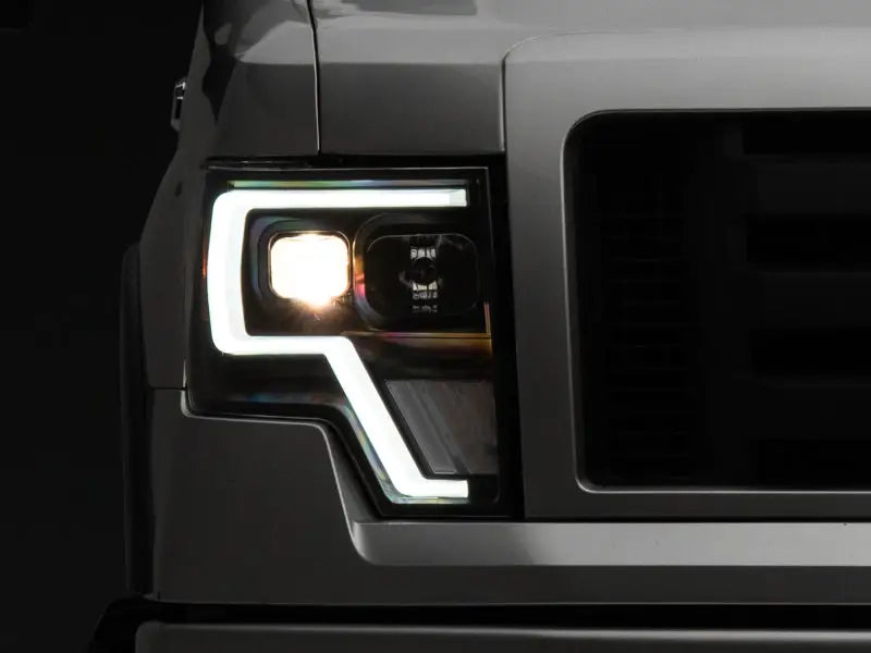 Raxiom 09-14 Ford F-150 G4 Projector Headlights- Black Housing (Clear Lens) - Truck & Automotive