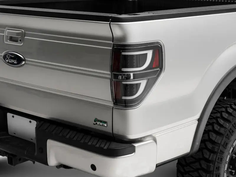 Ford truck taillight showing Raxiom G2 LED tail lights with black housing and clear lens