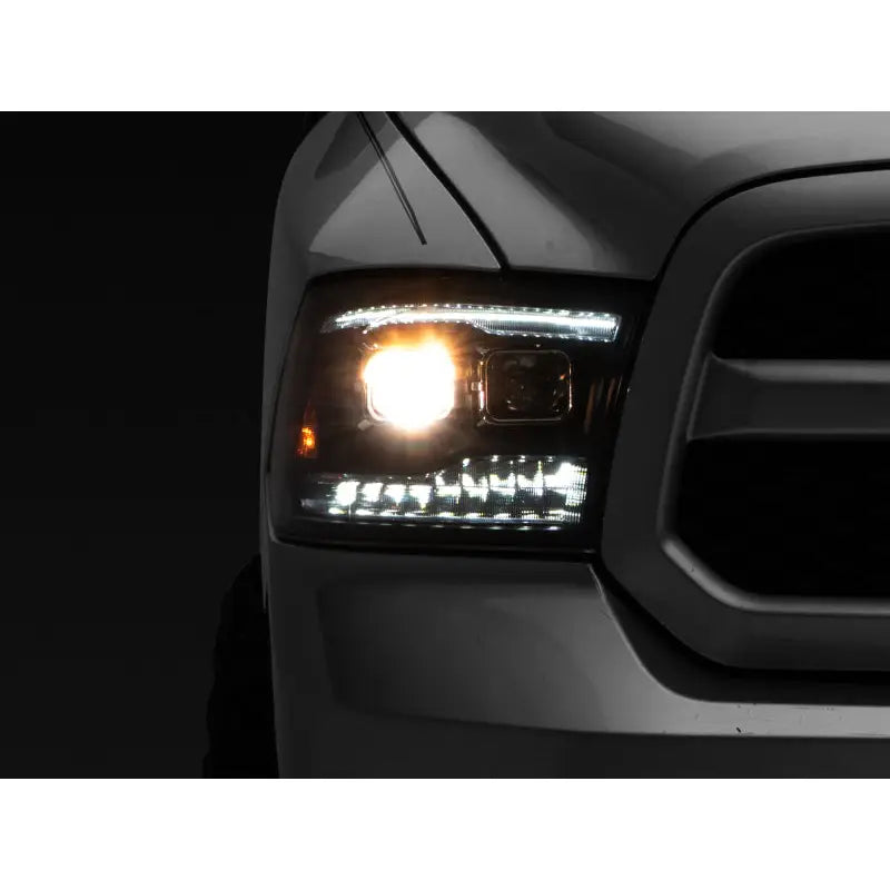 Raxiom R111520 Raxiom 09-18 RAM 1500 LED Projector Headlights w/ Switchback Turn Signals- Blk Housing (Clear Lens)