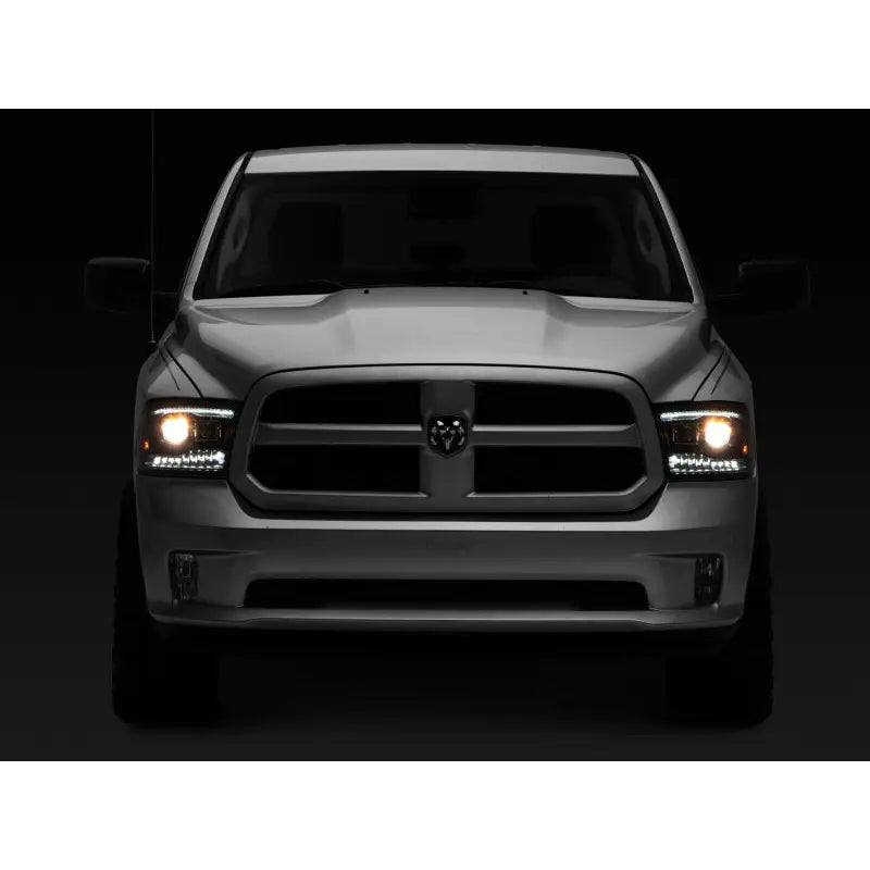Raxiom R111520 Raxiom 09-18 RAM 1500 LED Projector Headlights w/ Switchback Turn Signals- Blk Housing (Clear Lens)