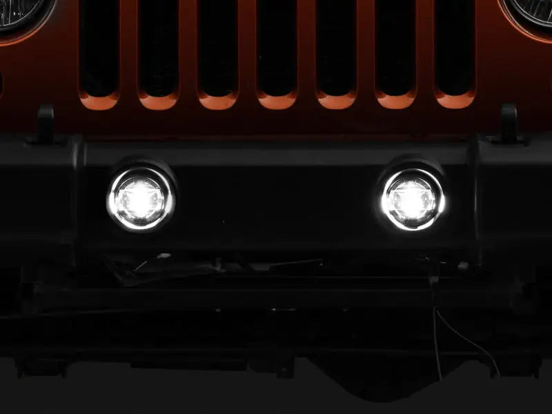 Illuminated Jeep bumper lights from Raxiom LED fog lights for Jeep Wrangler JKJL