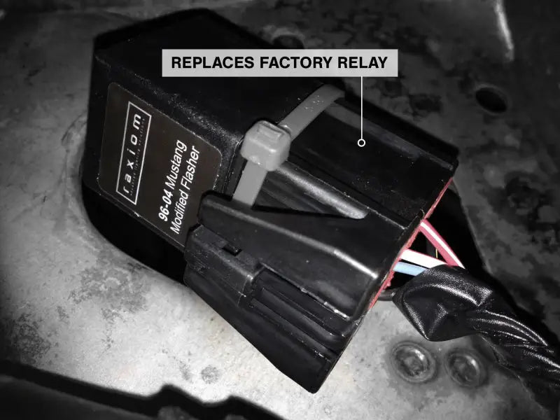 Black Raxiom Mustang modified turn signal flasher with zip tie for 96-04 Ford Mustangs