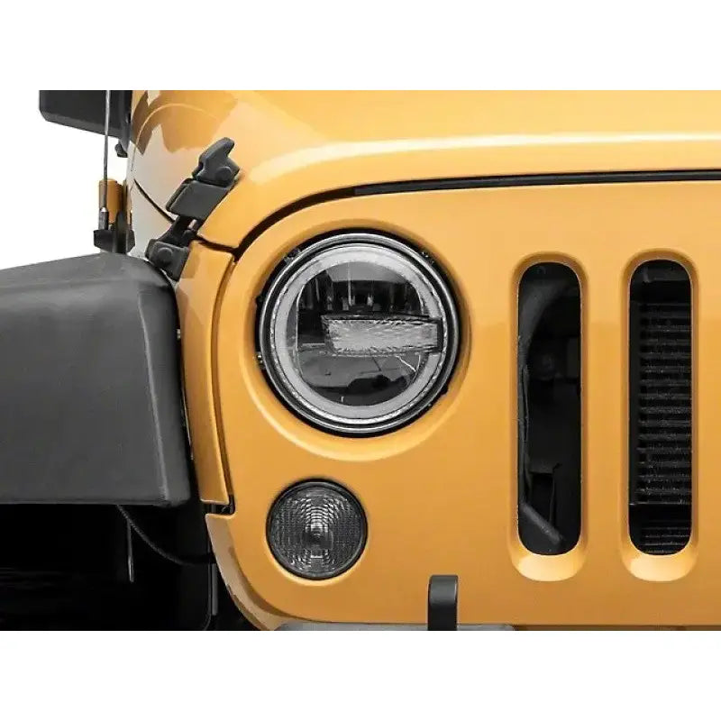 Raxiom 97-18 Jeep Wrangler TJ/JK 7-Inch LED Headlights w/ Halos- Black Housing (Clear Lens) - J155018