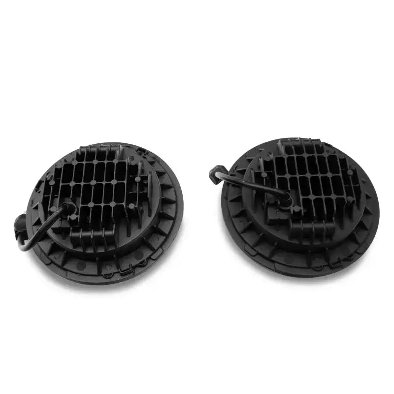 Two black round LED daymaker headlights with cooling fins for Jeep Wrangler TJ/JK