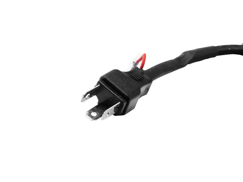 Black two-prong electrical plug for Axial Spider LED headlights on Jeep Wrangler TJ/JK