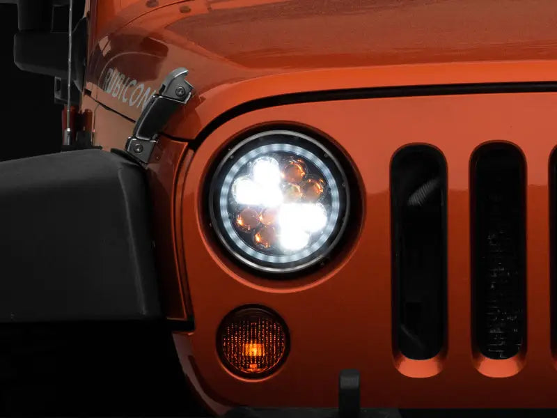 Orange Jeep Rubicon front with Raxiom 97-18 Jeep Wrangler TJ/JK Axial Spider LED headlights
