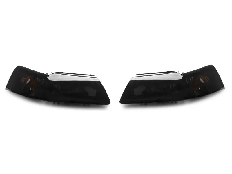 Pair of dark tinted headlights with smoked lens from Raxiom Axial Series OE Style Mustang