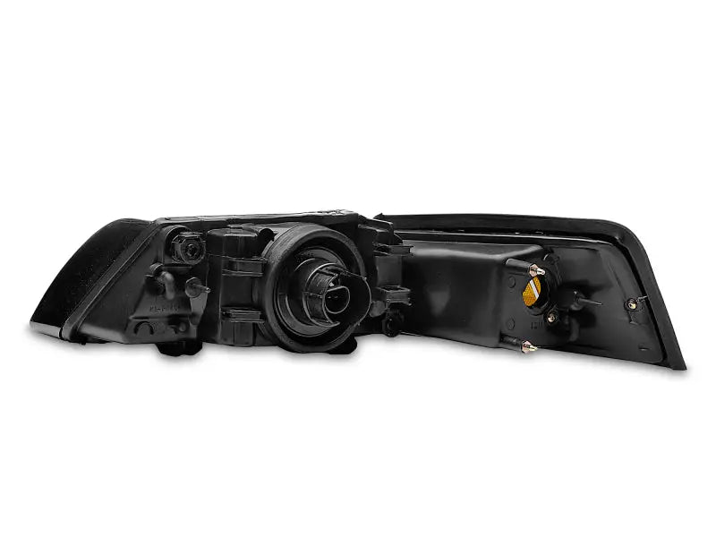 Black car headlight assembly from Raxiom Axial Series OE Style with smoked lens