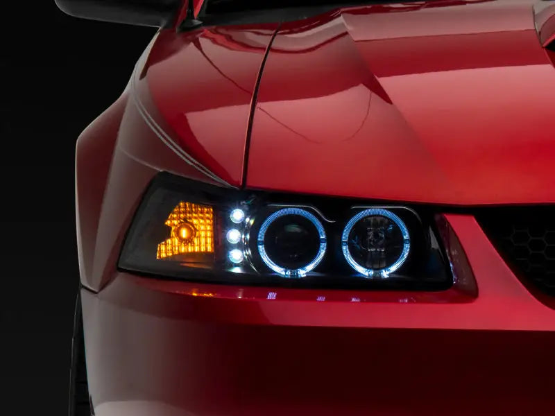 Red car headlight with LED halo and halo projector rings for Mustang upgrade